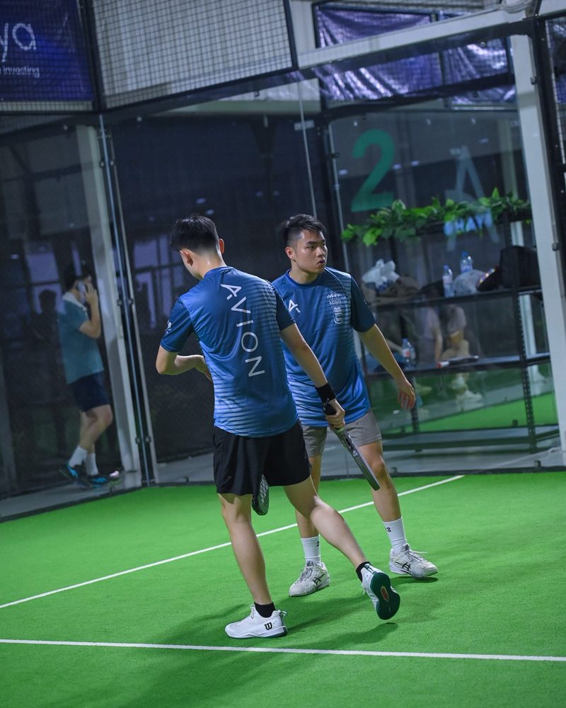 Doubles match on green court