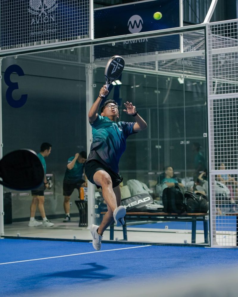 Player executing overhead smash